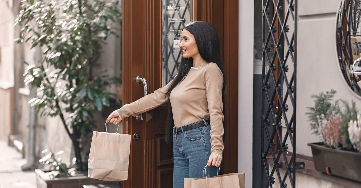How to exit LS customs? - Satisfied woman coming out from shop