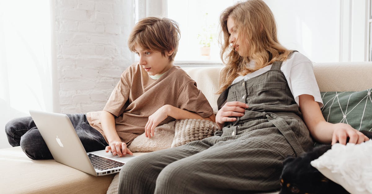 How to fake my laptop GPU? - Woman in Pink Long Sleeve Shirt Sitting Beside Man in Blue Denim Jacket