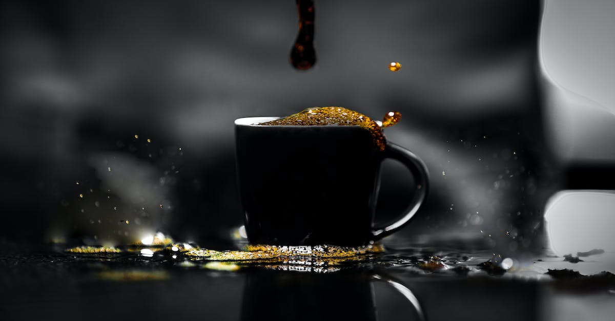 How to find a golden dropping fossil? - Cup of coffee spilled on black table