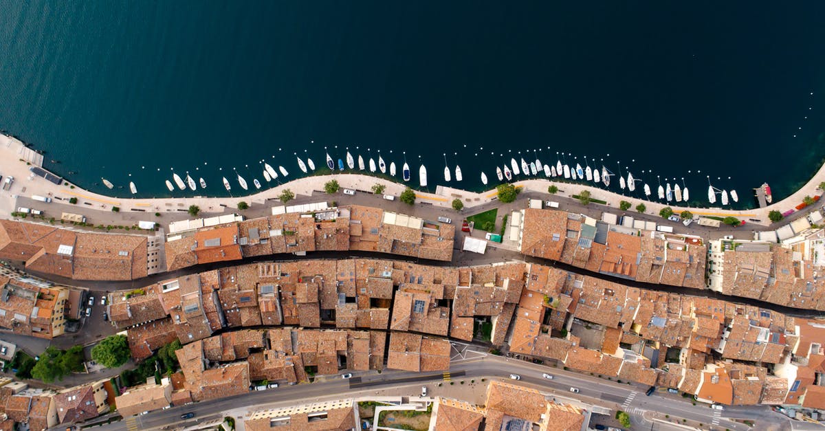 How to find specific buildings in a city - Brown Brick Building Near Body of Water How to find specific buildings in a city - Brown Brick Building Near Body of Water