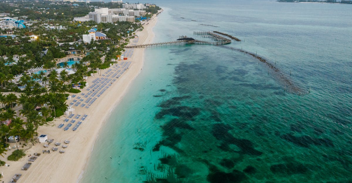 How to find specific buildings in a city - Aerial View of City Buildings Near Body of Water How to find specific buildings in a city - Aerial View of City Buildings Near Body of Water