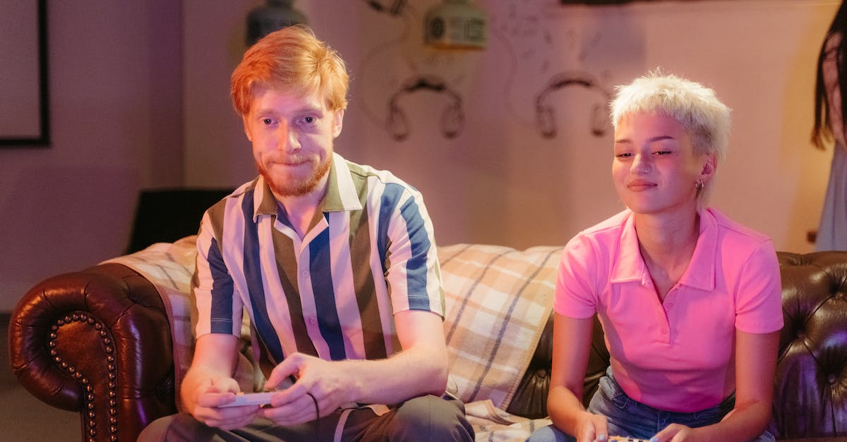 How to find the controls in-game of Arena? - Man in Pink Polo Shirt Sitting Beside Woman in Pink Shirt How to find the controls in-game of Arena? - Man in Pink Polo Shirt Sitting Beside Woman in Pink Shirt