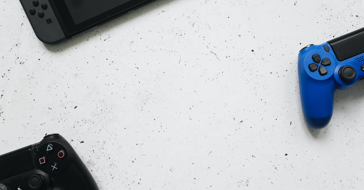 How to find the controls in-game of Arena? - Black and Blue Computer Mouse on White Table How to find the controls in-game of Arena? - Black and Blue Computer Mouse on White Table