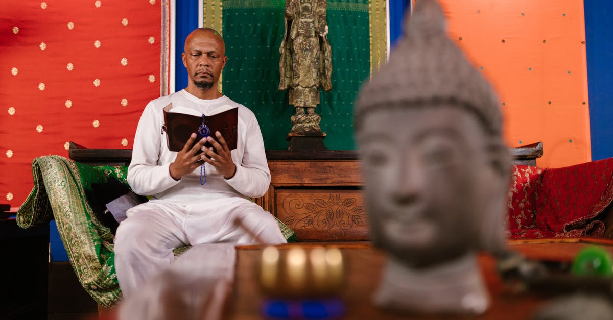 How to find the Lihzahrd temple in Terraria? [duplicate] - Man in White Thobe Sitting on Brown Wooden Bench