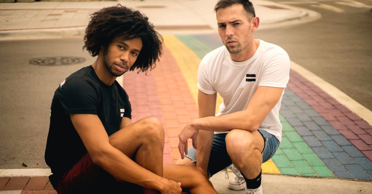 How to Get a Rainbow - Two Men Sitting on Road