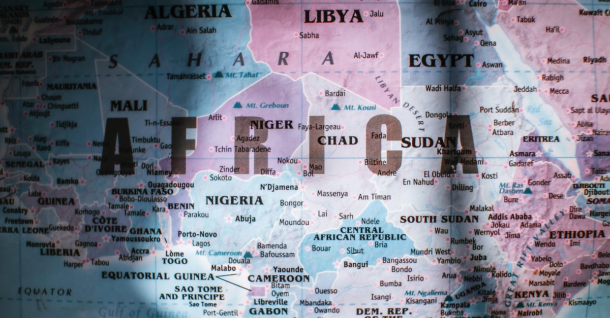 How to get a slowly expanding world border in Minecraft? - Top view of paper world map with continents and different countries oceans and seas placed in sunny room