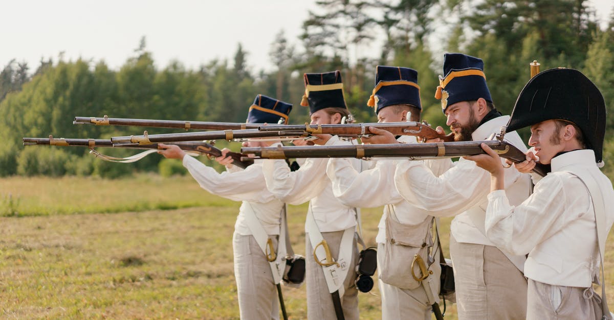 How to get a victory medal on the Teutoburg Forest historical battle? - Five Men in White Vintage Clothing and Black Hats Taking Aim with Guns How to get a victory medal on the Teutoburg Forest historical battle? - Five Men in White Vintage Clothing and Black Hats Taking Aim with Guns