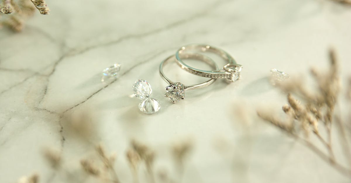 How to get infinite diamond armour/tools without crafting/infinetly? - Silver rings and diamonds on marble surface