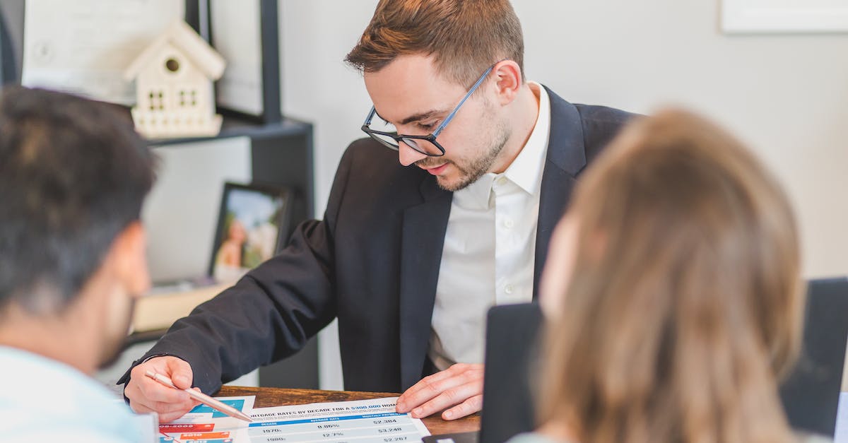 How to get Ingress portal ownership duration? - Real Estate Agent Discussing in Front of His Client