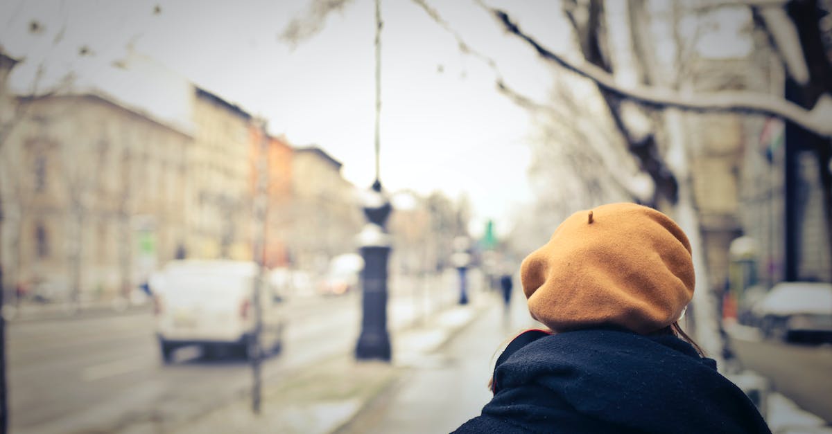 How to get my hat back on? - Person With Brown Hat Walking on Street