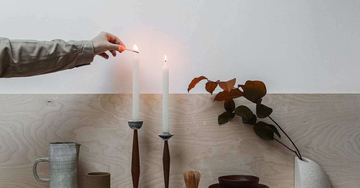 How to get off of Lighting Stance? - Person Holding White Candle Stick