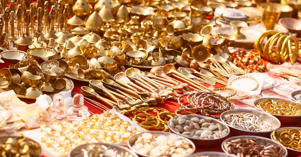 How to get the golden guns? - Gold and Silver Round Coins on White Ceramic Plate