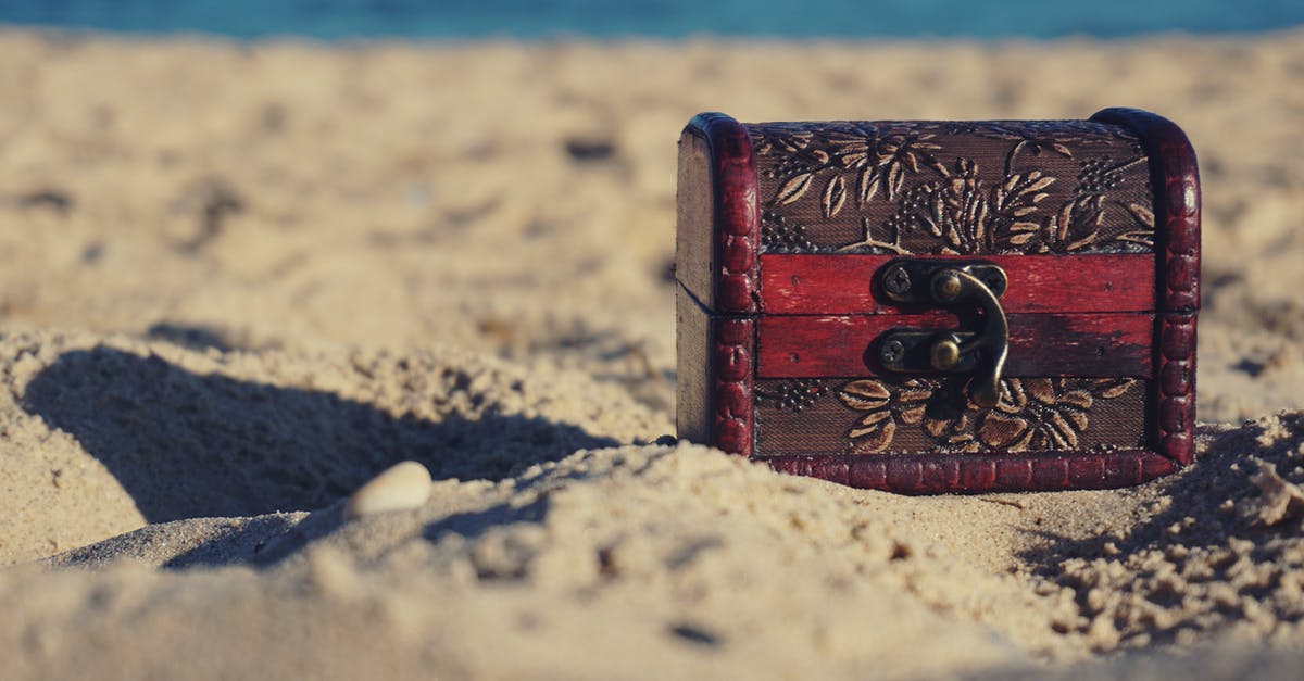 How to get to the treasure chest at level 1? - Red and Black Wooden Chest on White Sand