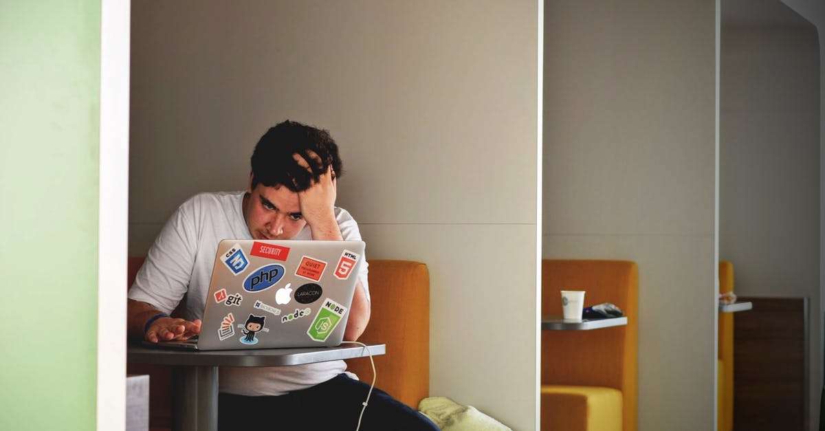 How to get unemployed people to work? - Man in White Shirt Using Macbook Pro