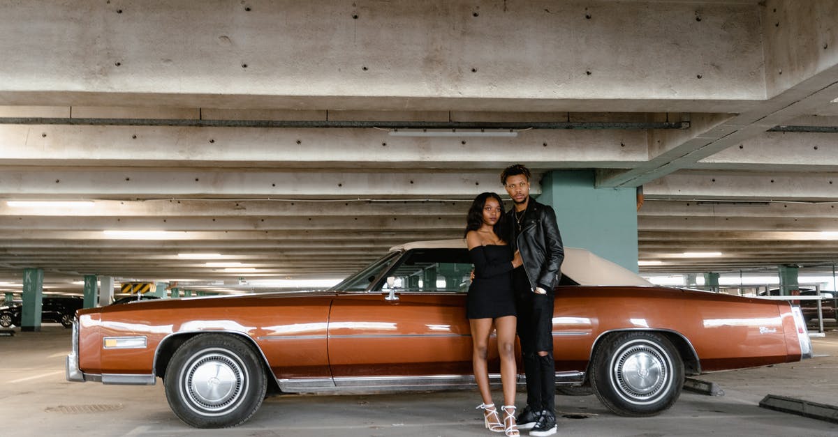 How to have my car near me when missions start? - A Couple Standing Together Near a Vintage Car How to have my car near me when missions start? - A Couple Standing Together Near a Vintage Car