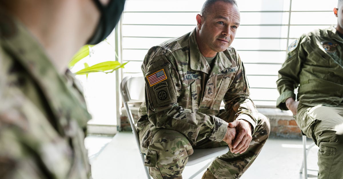 How to heal heroes and armies? - Photo of Soldiers Sitting on Folding Chairs