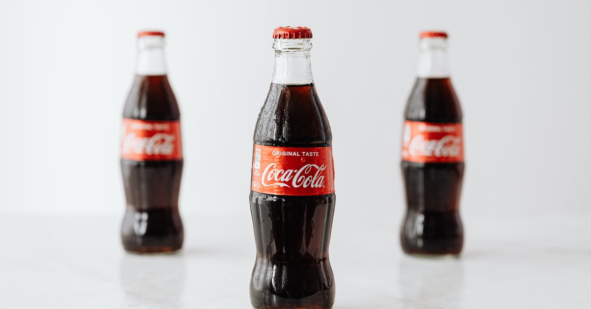 How to identify where's the chunks' boundaries? - Modern glass bottles of cold soda with red label placed on white reflective surface