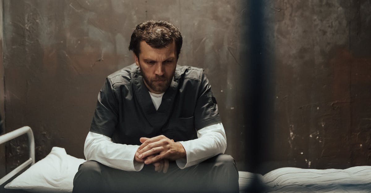 How to incorporate individual cells into existing cell blocks? - Man in Gray Dress Shirt Sitting on Bed