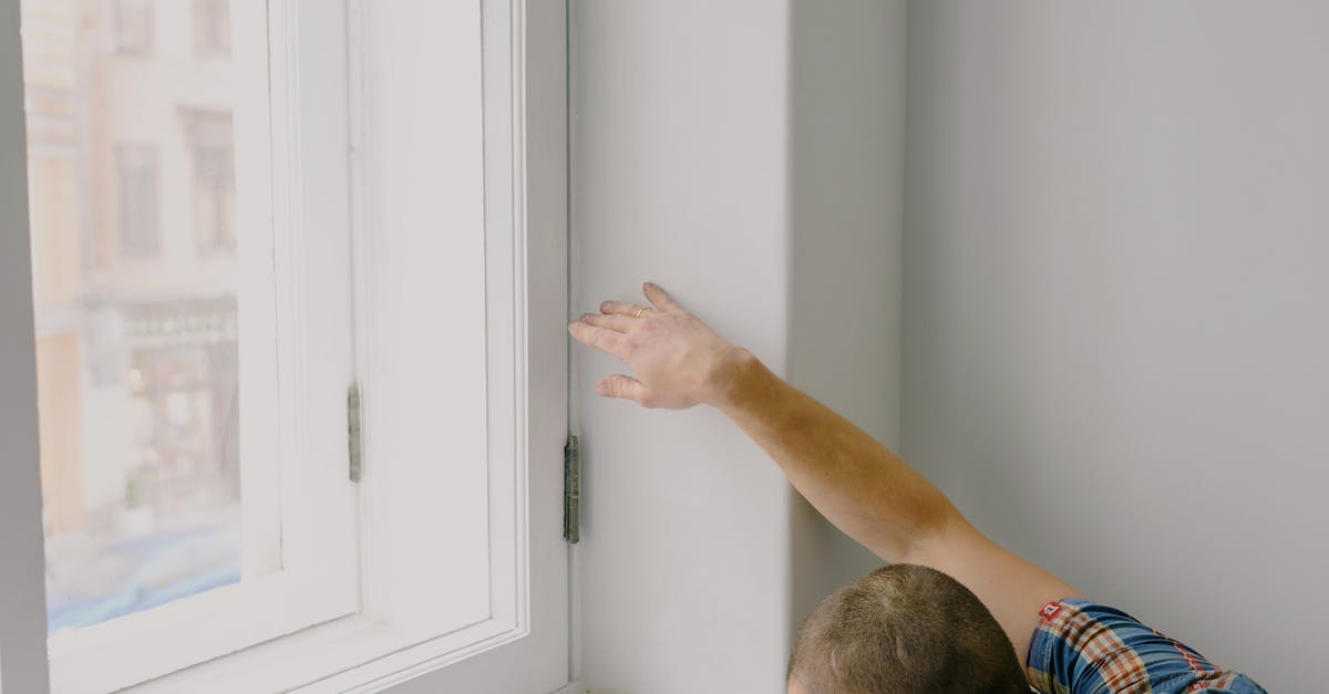 How to install mods for the new Minecraft launcher - Man installing new window in apartment