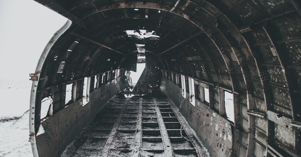How to land accurately with a plane? - Aged rusty aircraft interior on snowy terrain after disaster