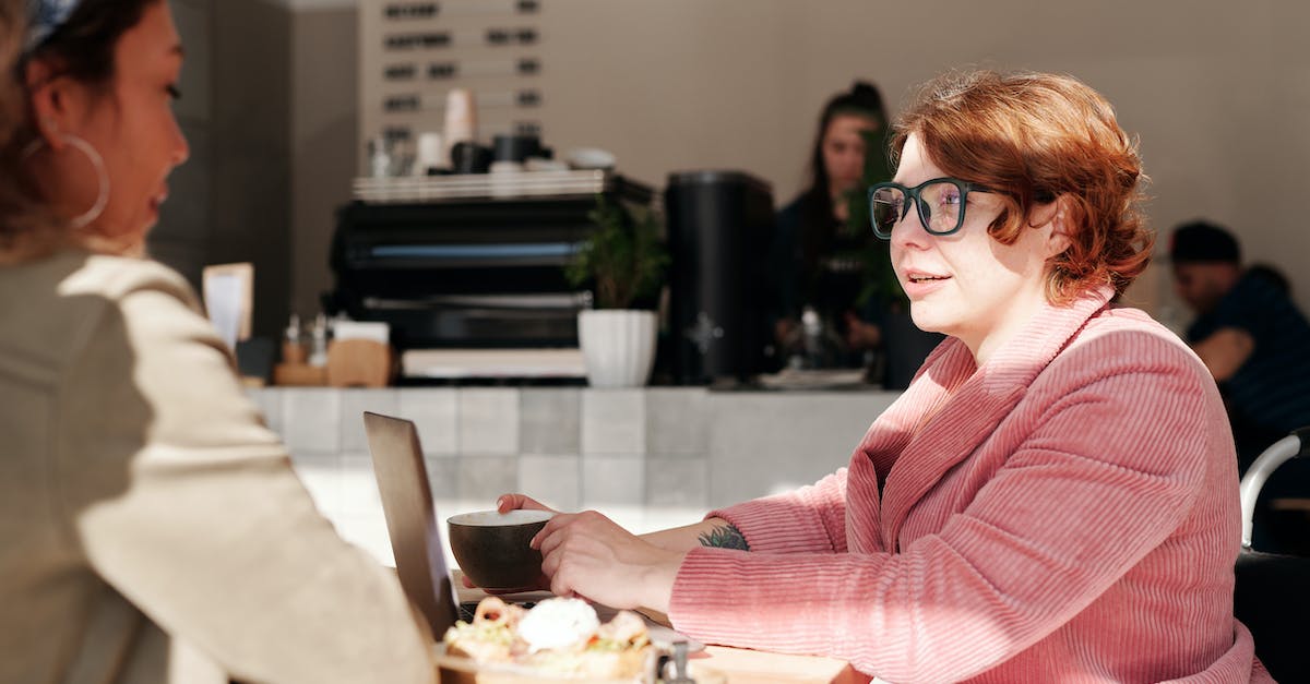 How to let two accounts to work with one device? - Woman in Pink Blazer Wearing Green Framed Eyeglasses