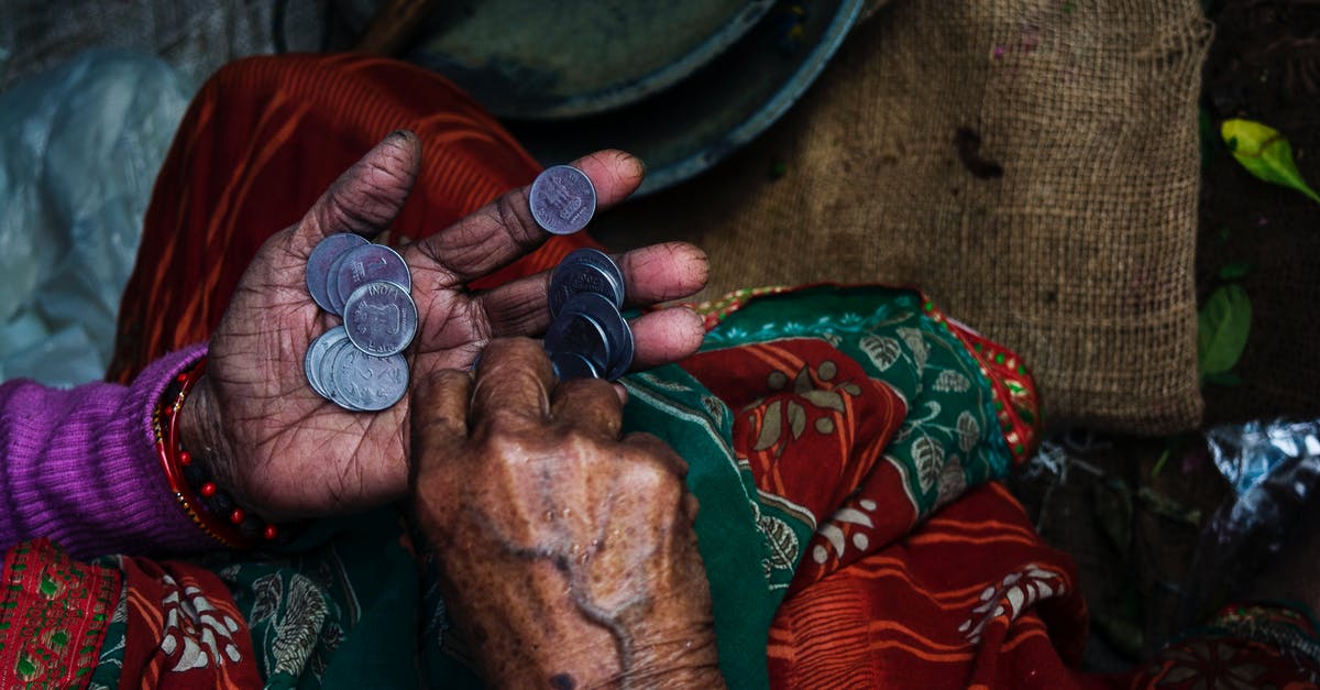 How to level up super fast in The Elder Scrolls V: Skyrim [closed] - Person Holding Coins