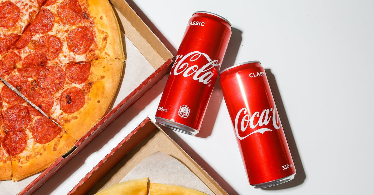 How to make a profitable fast food shop? - Coca Cola Cans Beside Pizza