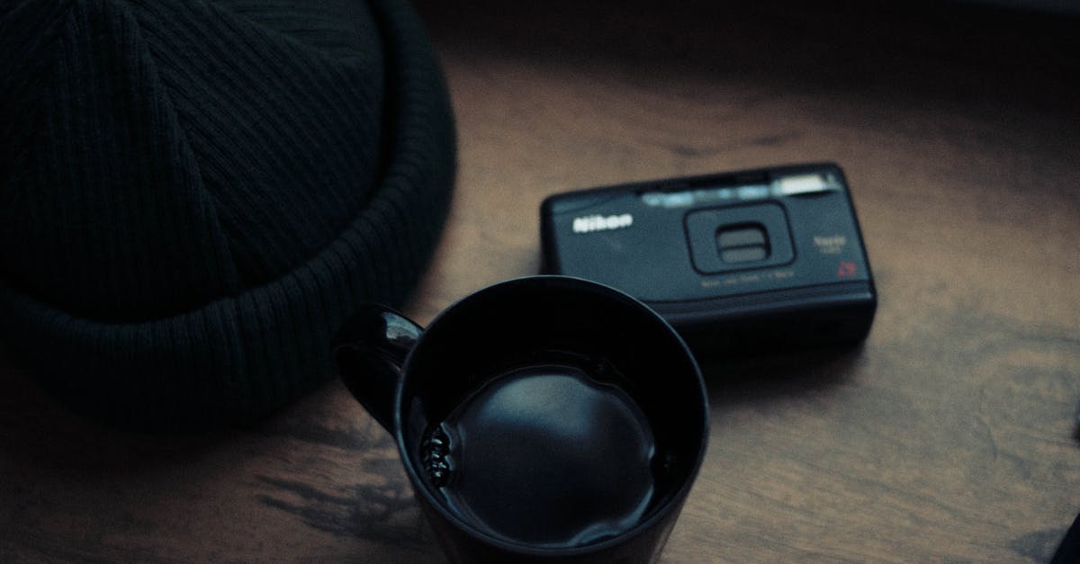 How to make an automatic spawn point when you die - From above mug of hot beverage placed on timber table near retro point and shoot camera and hat