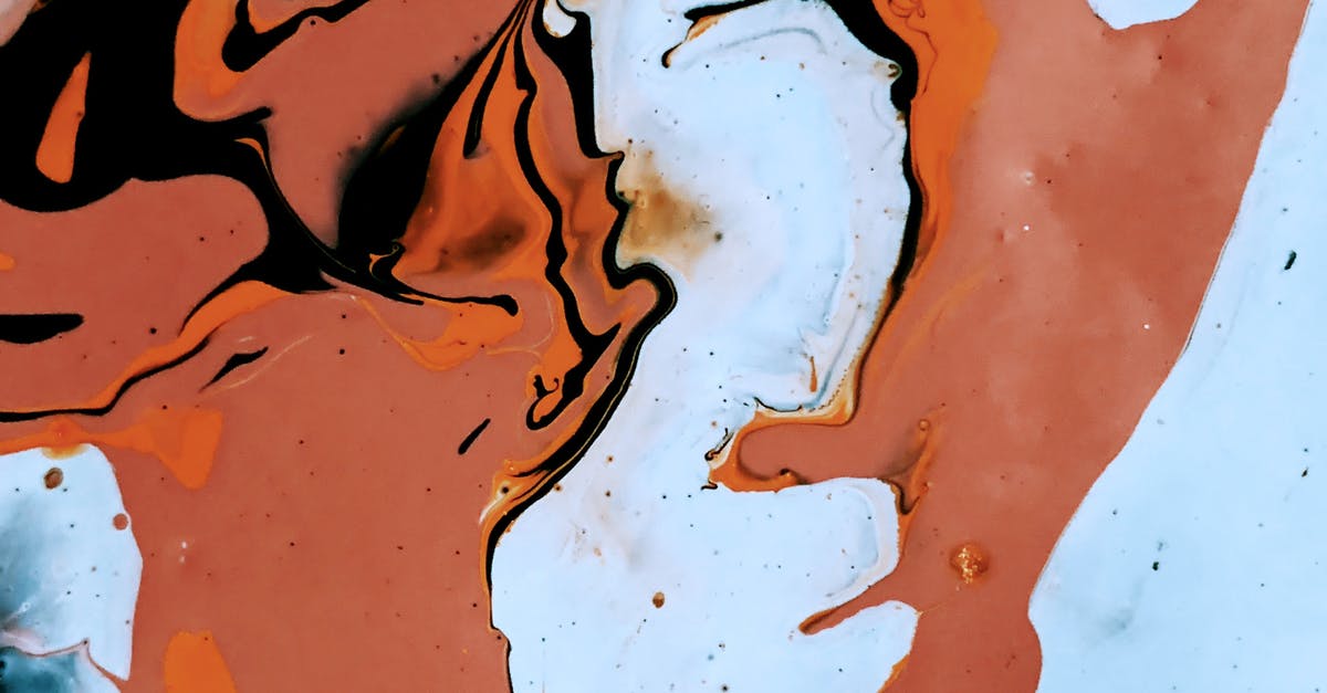 How to make an item drop in a random direction? - Abstract background of brown spots randomly spread over light blue surface and black spills paint on top
