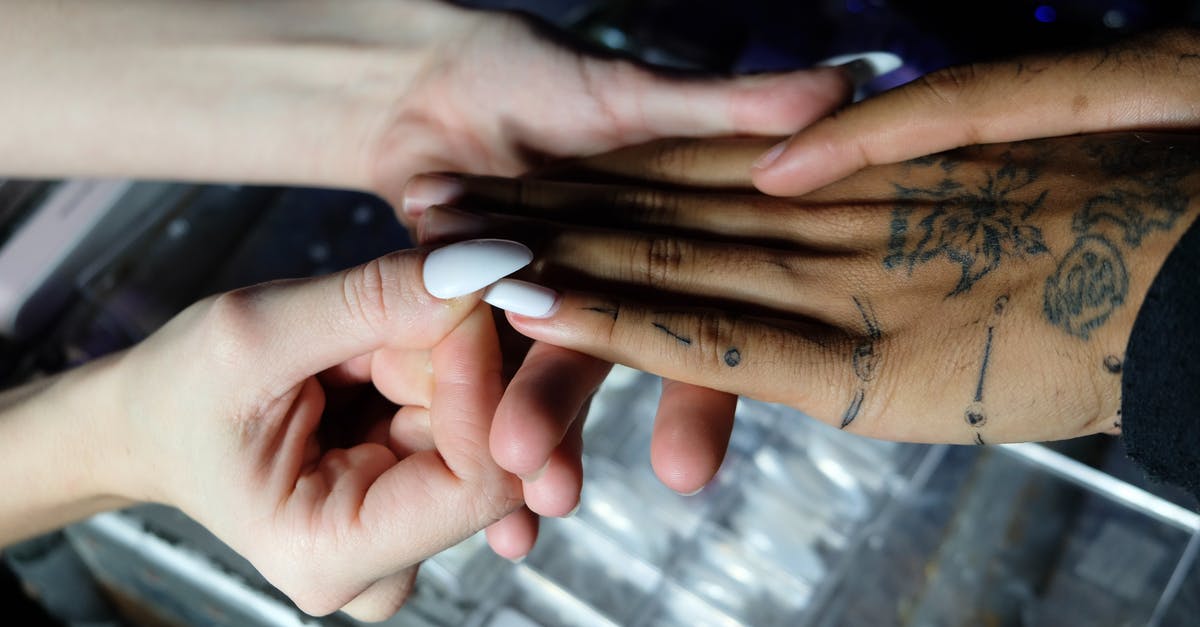 How to make fearless deadly stoic volatile prisoners do their time? - Woman doing manicure to ethnic client How to make fearless deadly stoic volatile prisoners do their time? - Woman doing manicure to ethnic client
