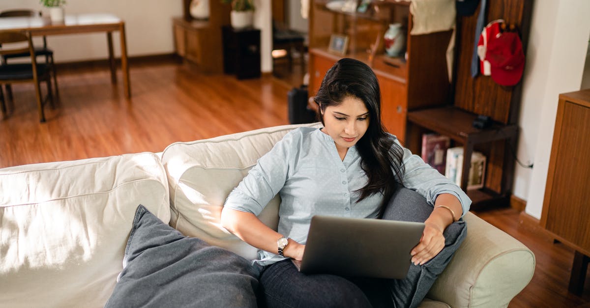 How to make FFXIV chat sticky from typing? - From above of young ethnic woman with long dark hair in casual clothes sitting on sofa and surfing internet on netbook while working remotely in cozy living room How to make FFXIV chat sticky from typing? - From above of young ethnic woman with long dark hair in casual clothes sitting on sofa and surfing internet on netbook while working remotely in cozy living room