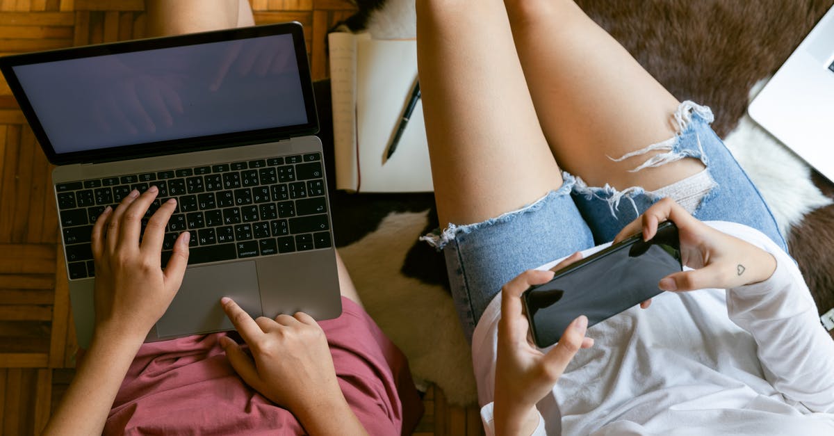 How to make FFXIV chat sticky from typing? - From above of crop girlfriends in home clothes sitting on floor with laptop and smartphone while spending time together and planning weekend How to make FFXIV chat sticky from typing? - From above of crop girlfriends in home clothes sitting on floor with laptop and smartphone while spending time together and planning weekend