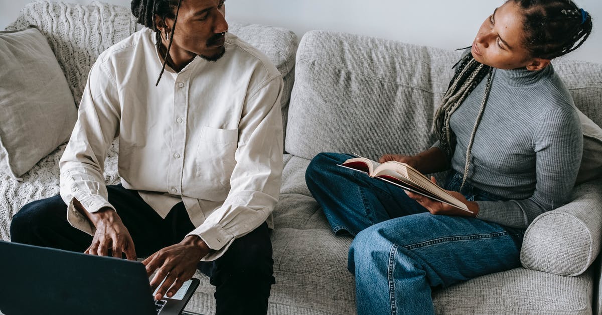 How to make FFXIV chat sticky from typing? - From above of serious young African American husband and wife in casual outfits sitting on sofa with book and laptop and discussing relationships in cozy living room How to make FFXIV chat sticky from typing? - From above of serious young African American husband and wife in casual outfits sitting on sofa with book and laptop and discussing relationships in cozy living room