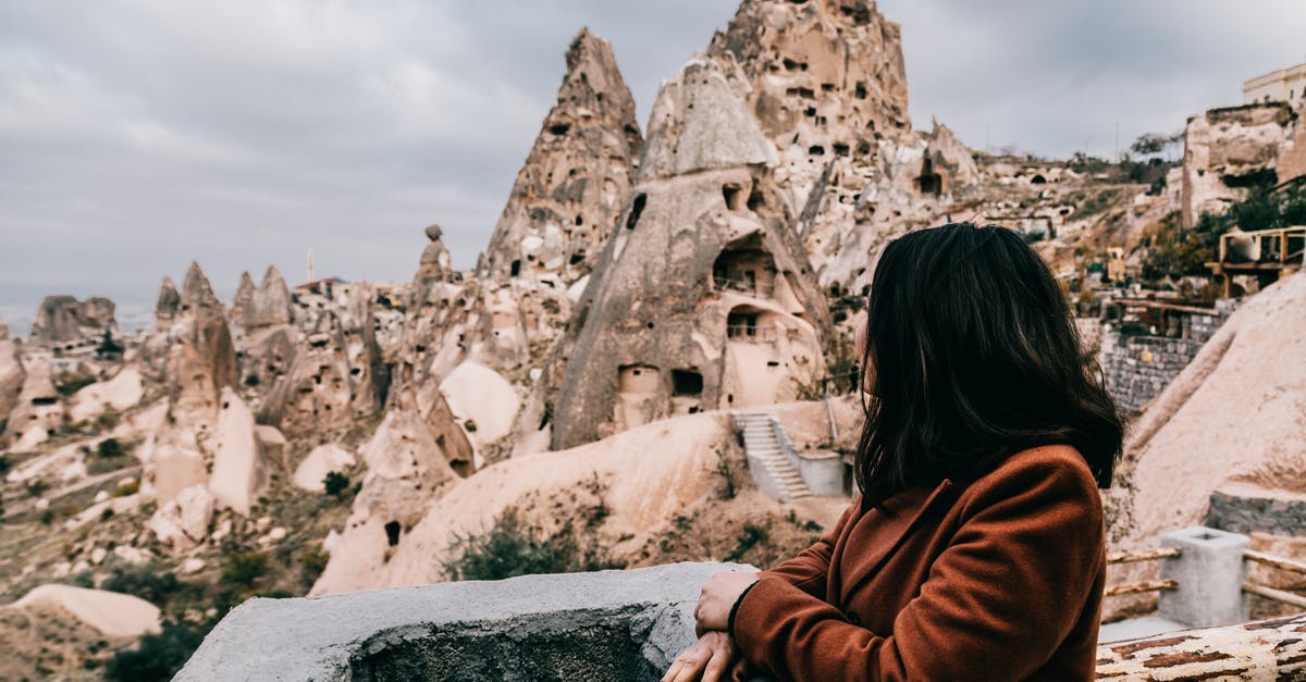 How to make it to where players can place a lever on a certain block? Adventure Mode [duplicate] - Unrecognizable woman enjoying view of ancient buildings