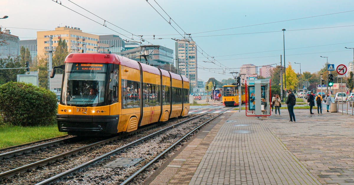 How to make my trains go through stations - Yellow Train on Railway Track