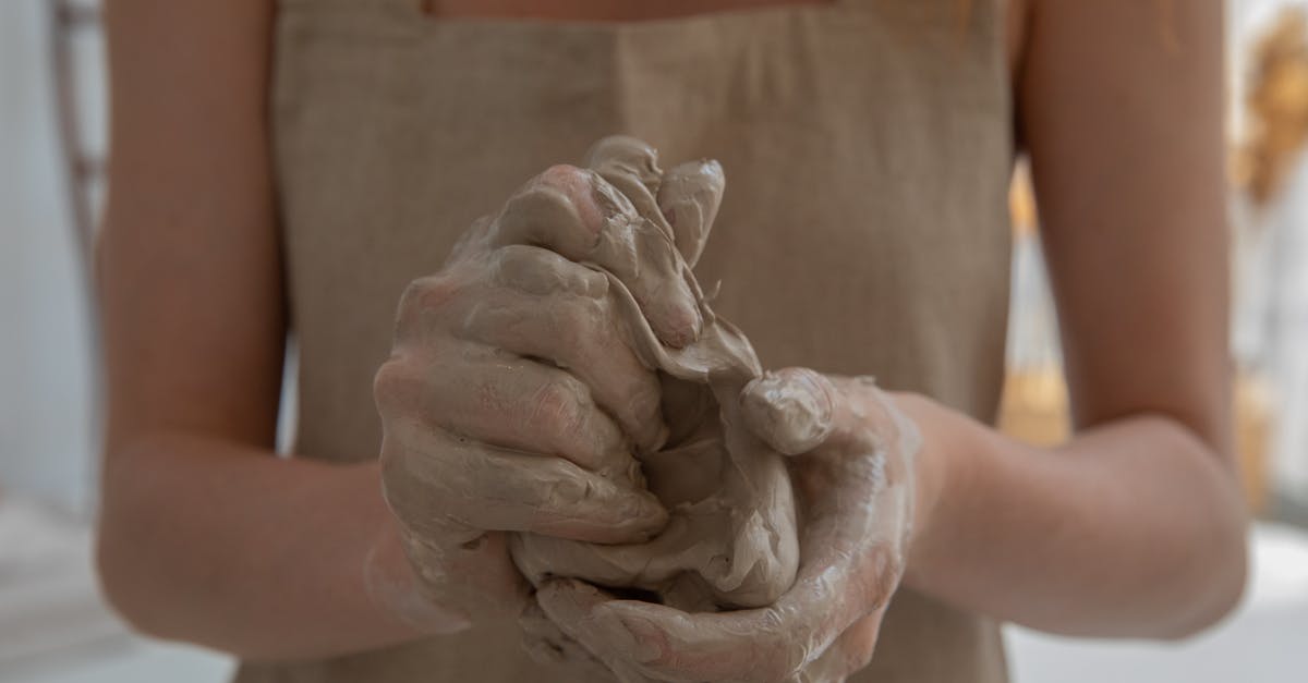 How to make Proton work correctly on Debian? - Crop faceless woman kneading clay in workshop