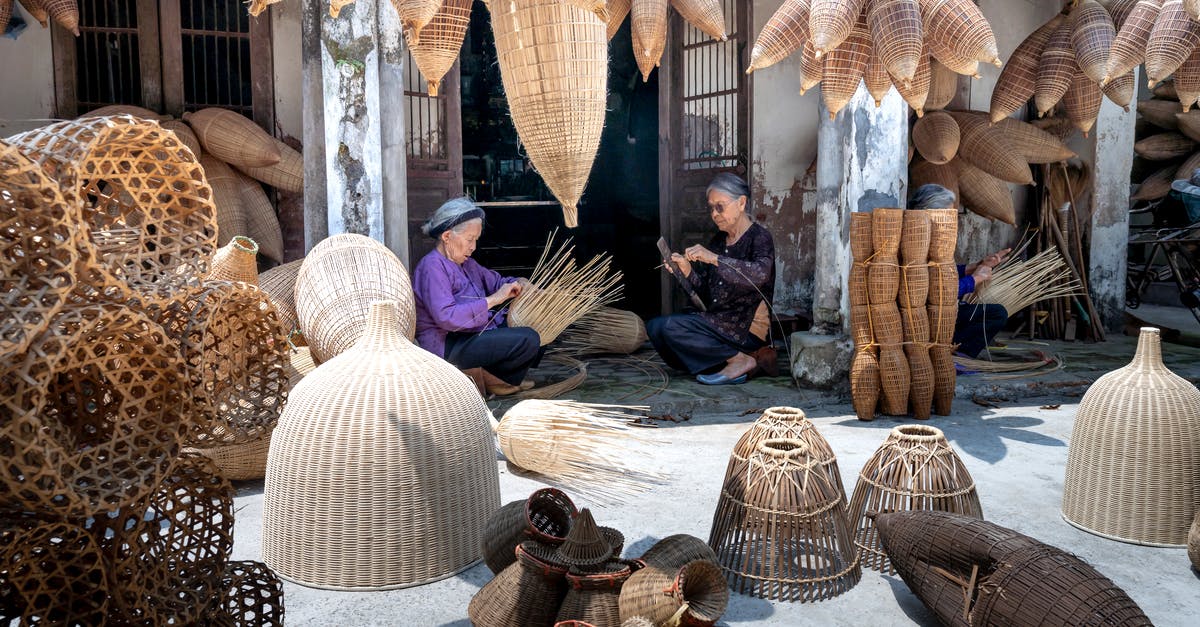 How to make the most out of operations? - Elderly Vietnamese women working and making wicker bamboo fish traps How to make the most out of operations? - Elderly Vietnamese women working and making wicker bamboo fish traps
