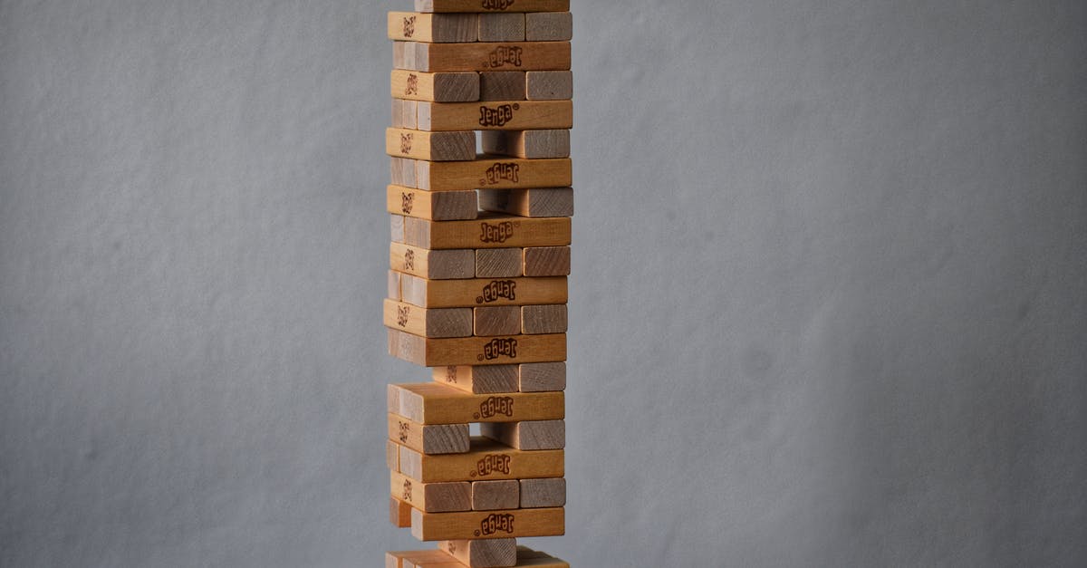 How to merge item stacks? - Party game with wooden blocks placed on top of each other as tower for playing How to merge item stacks? - Party game with wooden blocks placed on top of each other as tower for playing