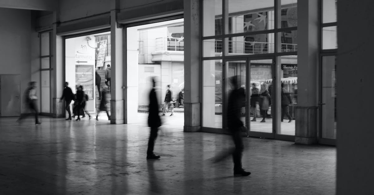 How to move office - Public building hallway with rushing people How to move office - Public building hallway with rushing people