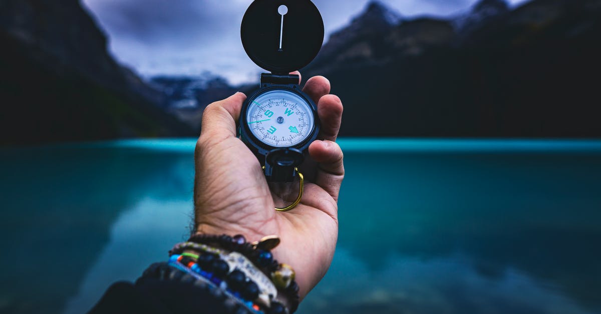 How to navigate without a compass? - Person Holding A Compass