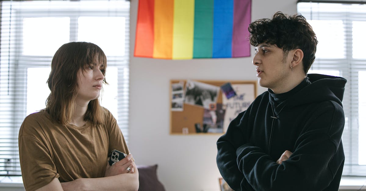 How to obtain rainbow chips? - Man in Black Sweater Sitting Beside Woman in Brown Long Sleeve Shirt
