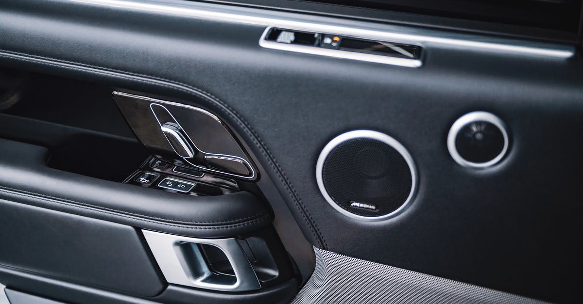 How to open locked door to Frifle and the Grey Mauser? - From above of modern style auto interior with plastic panel on door with handle with lock and round shaped buttons How to open locked door to Frifle and the Grey Mauser? - From above of modern style auto interior with plastic panel on door with handle with lock and round shaped buttons