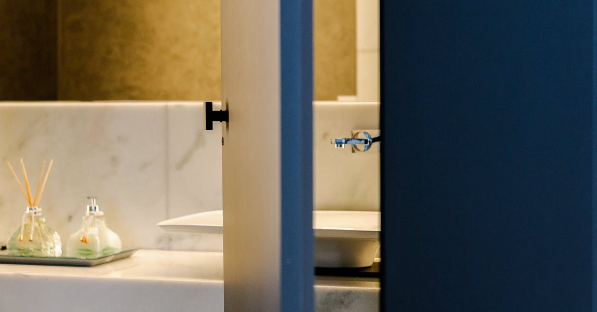 How to open the maintenance door in the sierra madre vault - Modern bathroom with marble wall and sink