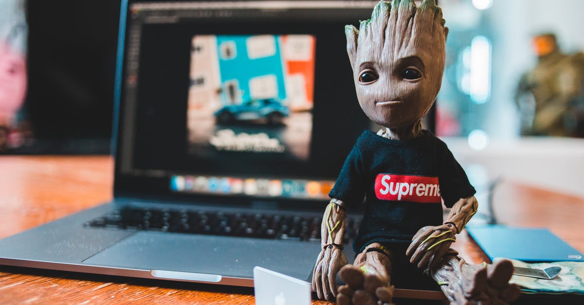 How to open up the list of players currently online in a Minecraft Server? - Toy superhero near laptop on table at home How to open up the list of players currently online in a Minecraft Server? - Toy superhero near laptop on table at home