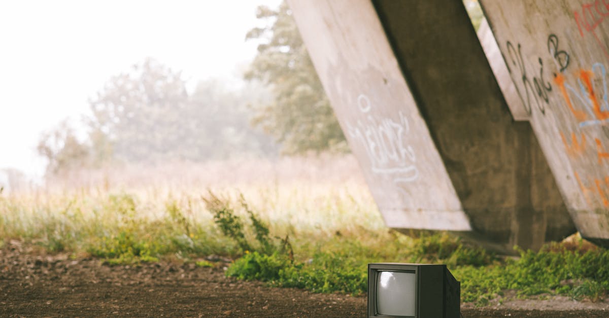 How to optimize bridge links for structure use? - Small black old fashioned television placed on ground near concrete construction with graffiti and grassy terrain with trees on foggy background How to optimize bridge links for structure use? - Small black old fashioned television placed on ground near concrete construction with graffiti and grassy terrain with trees on foggy background