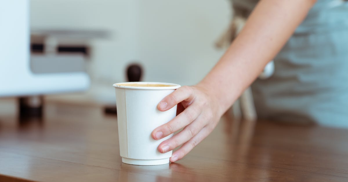 How to pass the "Key To Her Heart" mission (Hot Coffee mod)? - Crop barista serving coffee in paper cup