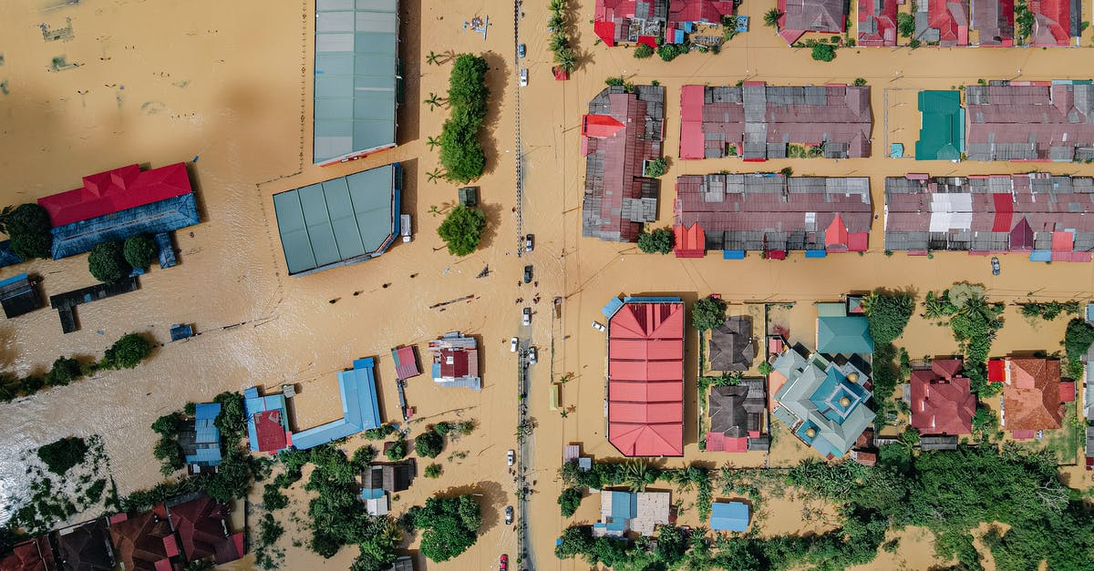 How to place a block in a random area within a radius - Flooded small village with residential houses
