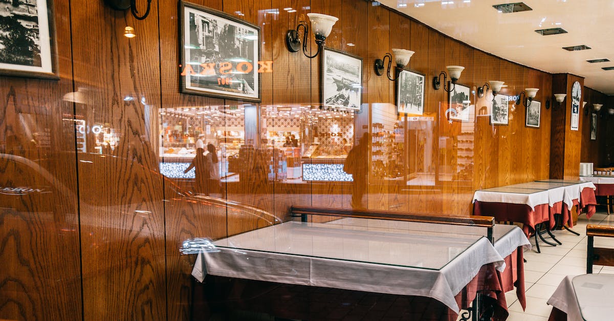 How to place objects in the showcases? - Interior of modern cafe with pictures