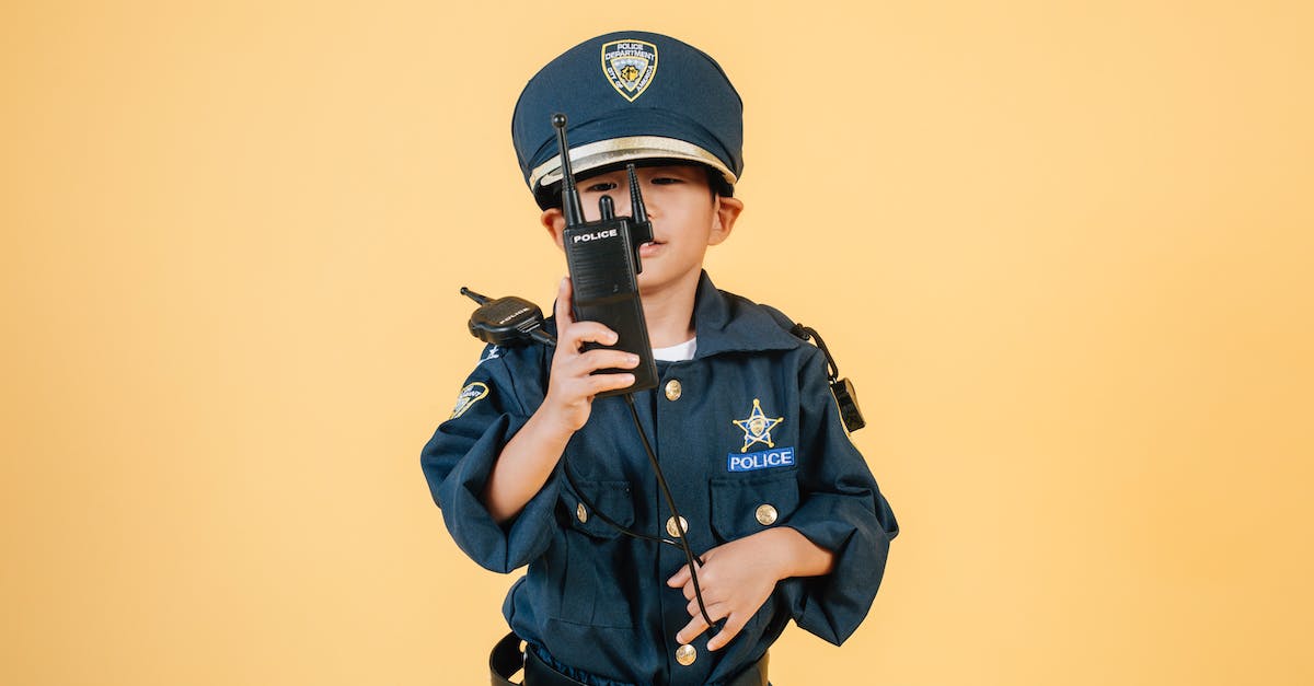 How to play Call of Duty World at War without having to put in the disc? - Asian boy in police uniform against yellow background