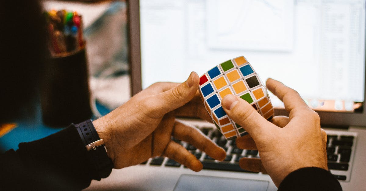 How to play FIFA on a basic laptop without over-heating the laptop? [closed] - 4x4 Rubik's Cube on a Man's Hand